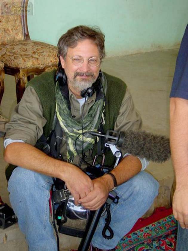 Stan working at a Press Conference